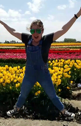 an image of Katie Borgia, jumping in the air